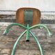 Former green metal workshop chair