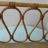 Wall shelf in rattan