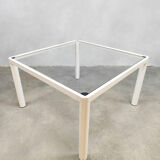 Plia' chairs by Giancarlo Piretti for Castelli with a table