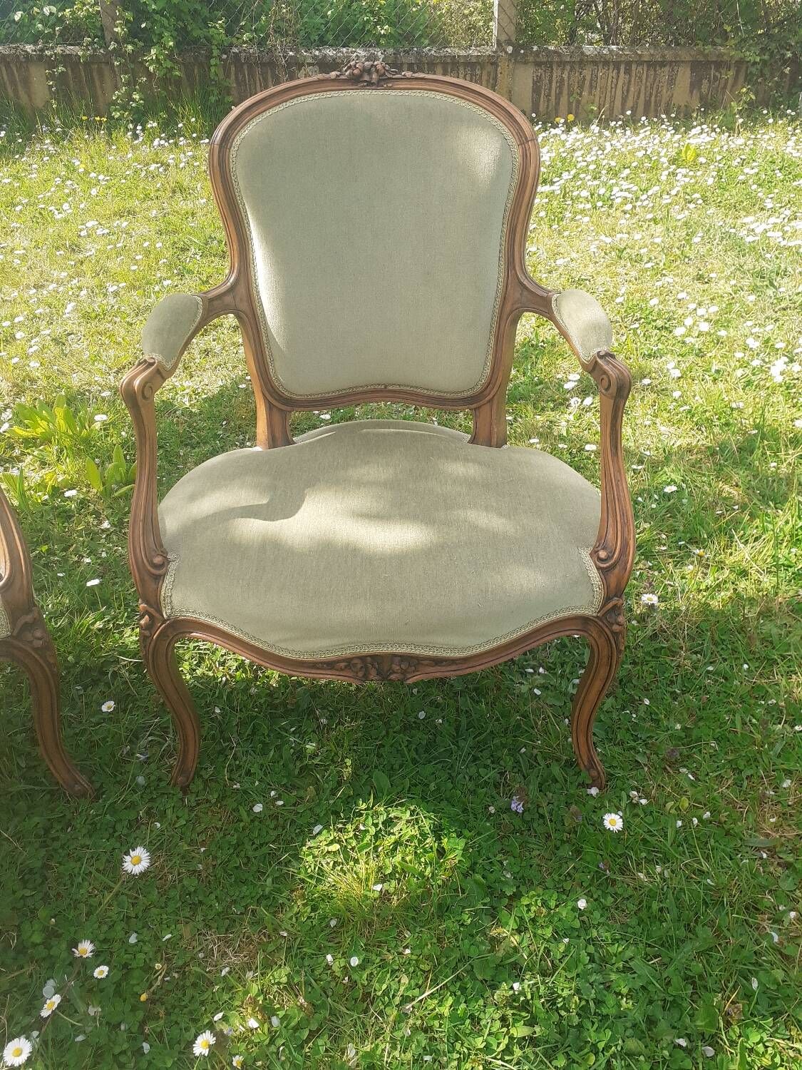 Pair of Rocaille style armchairs in green fabric and walnut, 19th century