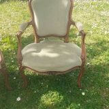 Pair of Rocaille style armchairs in green fabric and walnut, 19th century