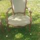 Pair of Rocaille style armchairs in green fabric and walnut, 19th century