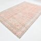 Tapis vintage à décor floral rouge et beige