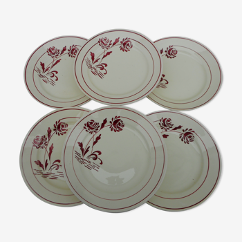 Six flat earthenware plates