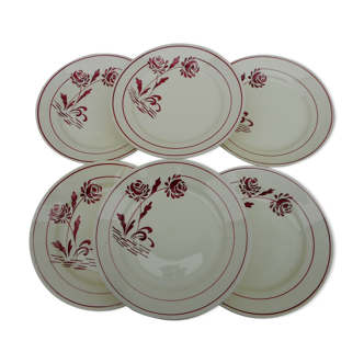 Six flat earthenware plates