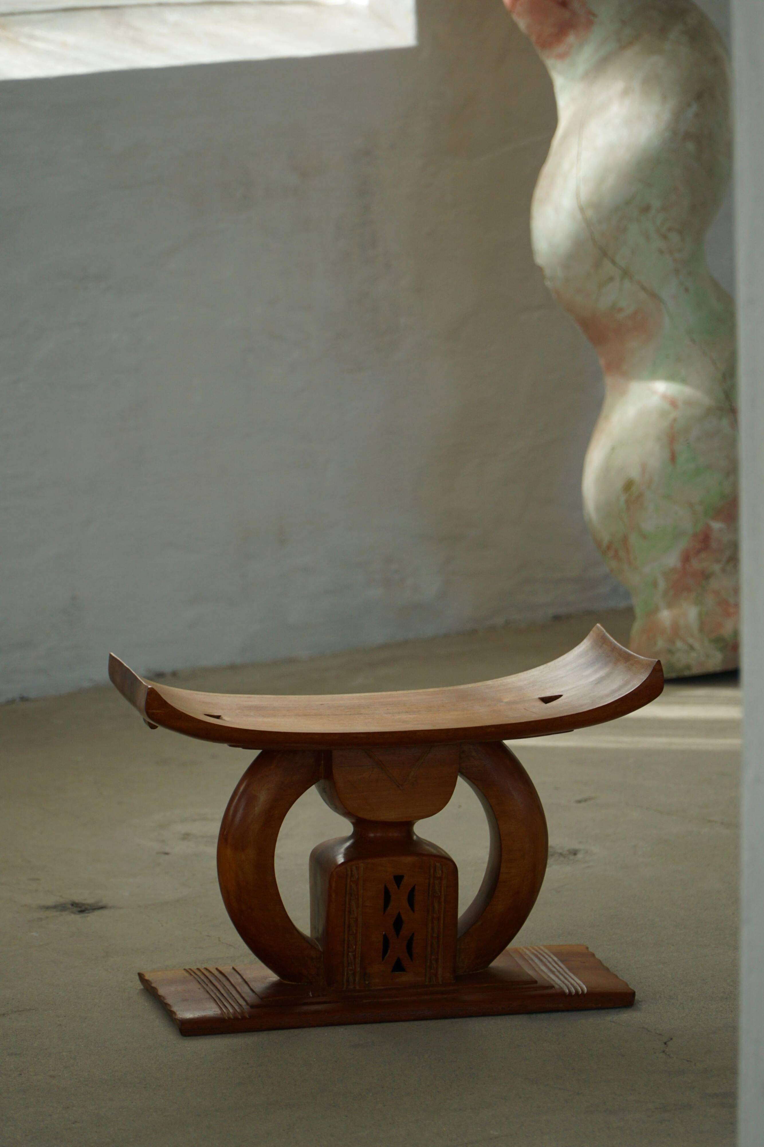 Ashanti stool from West Africa, carved from hardwood, 20th century.