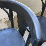 Set of 7 black bistro chairs