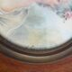Miniature hand-painted portrait of a woman signed