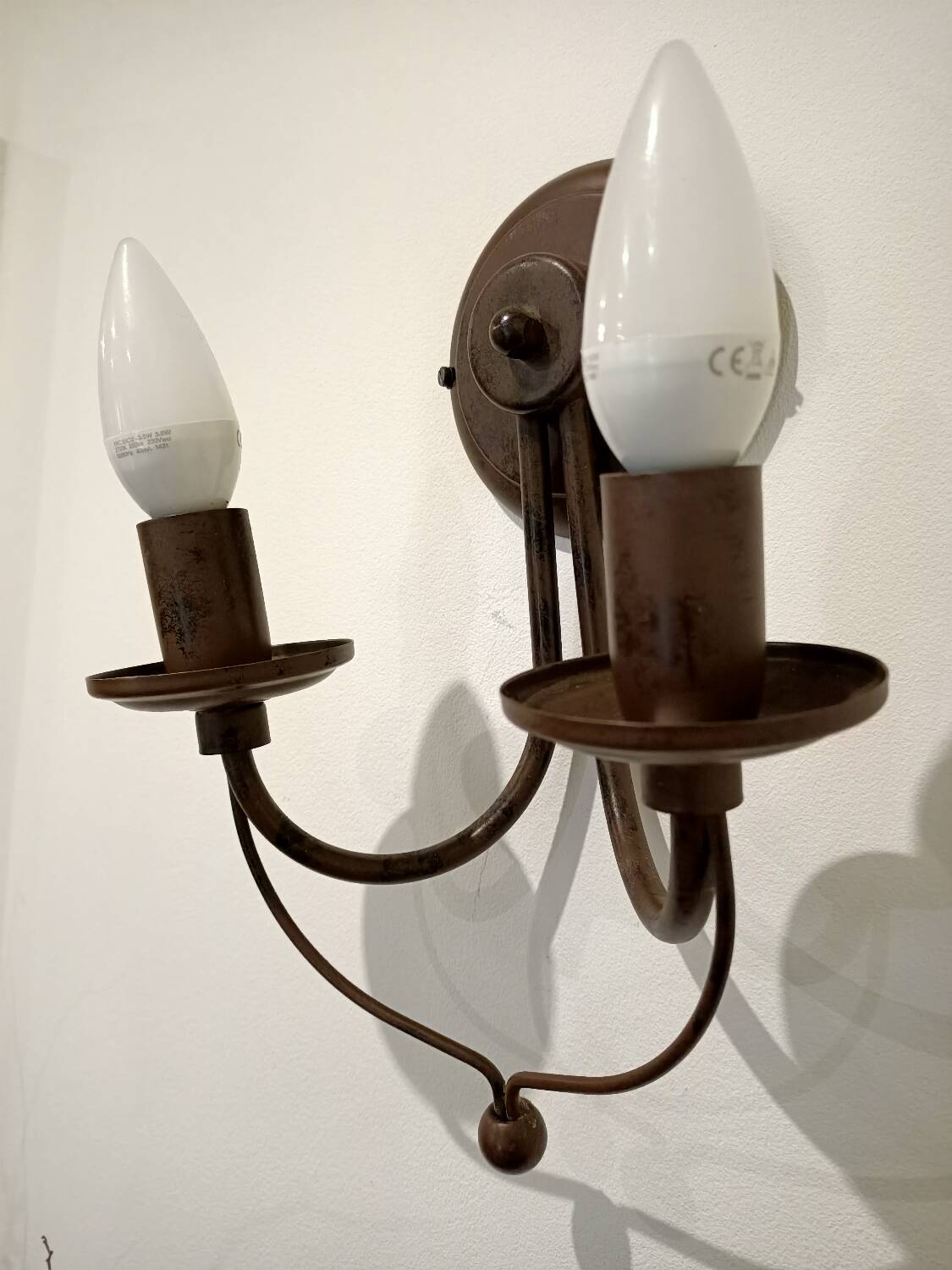 Pair of matte metal wall lights