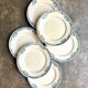 6 assiettes plates Longchamp en terre de fer, service "Lily"