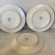 Set of three flat plates with botanical flowers by Villeroy & Boch.