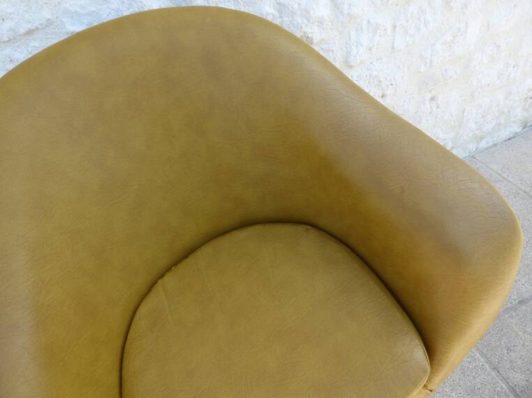 Vintage swivel armchair from the 70s in imitation leather