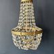 Golden bronze hot air balloon chandelier with glass pendants, mid-20th century.