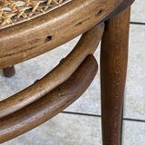 Bistro chair with a curved wooden frame and caned seat from the 1930s.