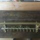 White wrought iron coat and hat rack