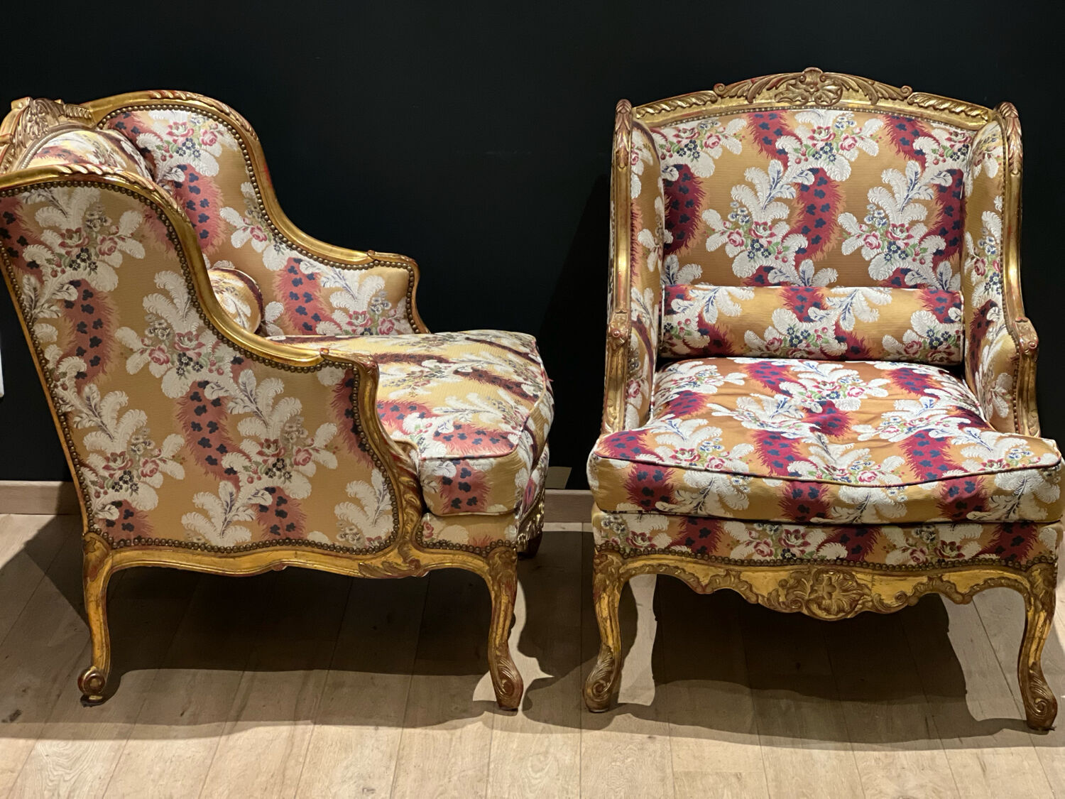 Pair of gilded armchairs