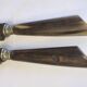 Table service knives old steel blade horn ferrule