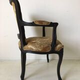 Black baroque armchair with fabric designed by wildlife by Ascension Latorre, Spain