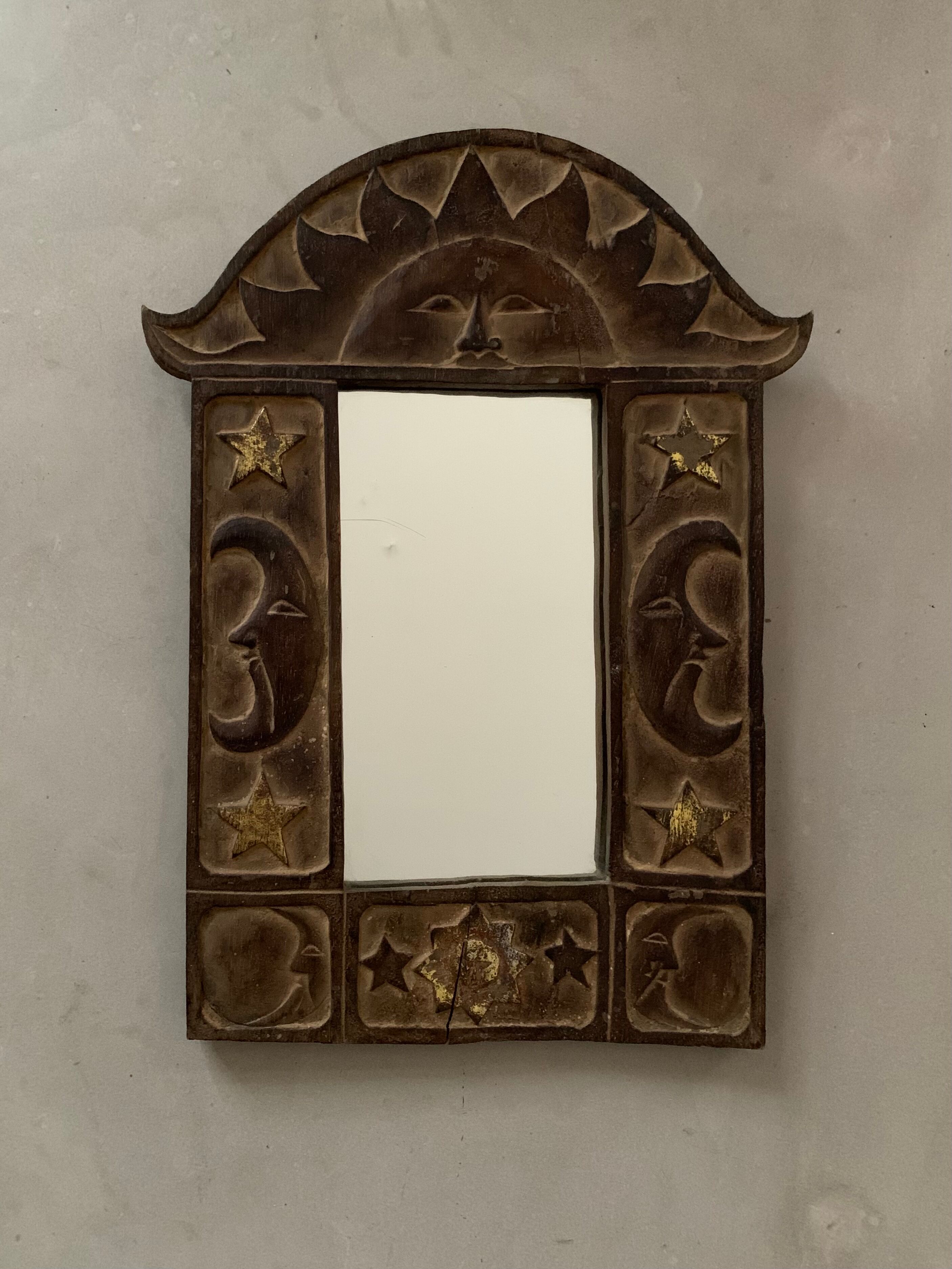 Antique carved wooden mirror