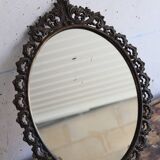 Baroque style oval metal mirror