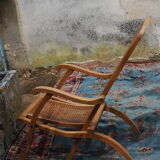 Cane folding armchair in solid wood