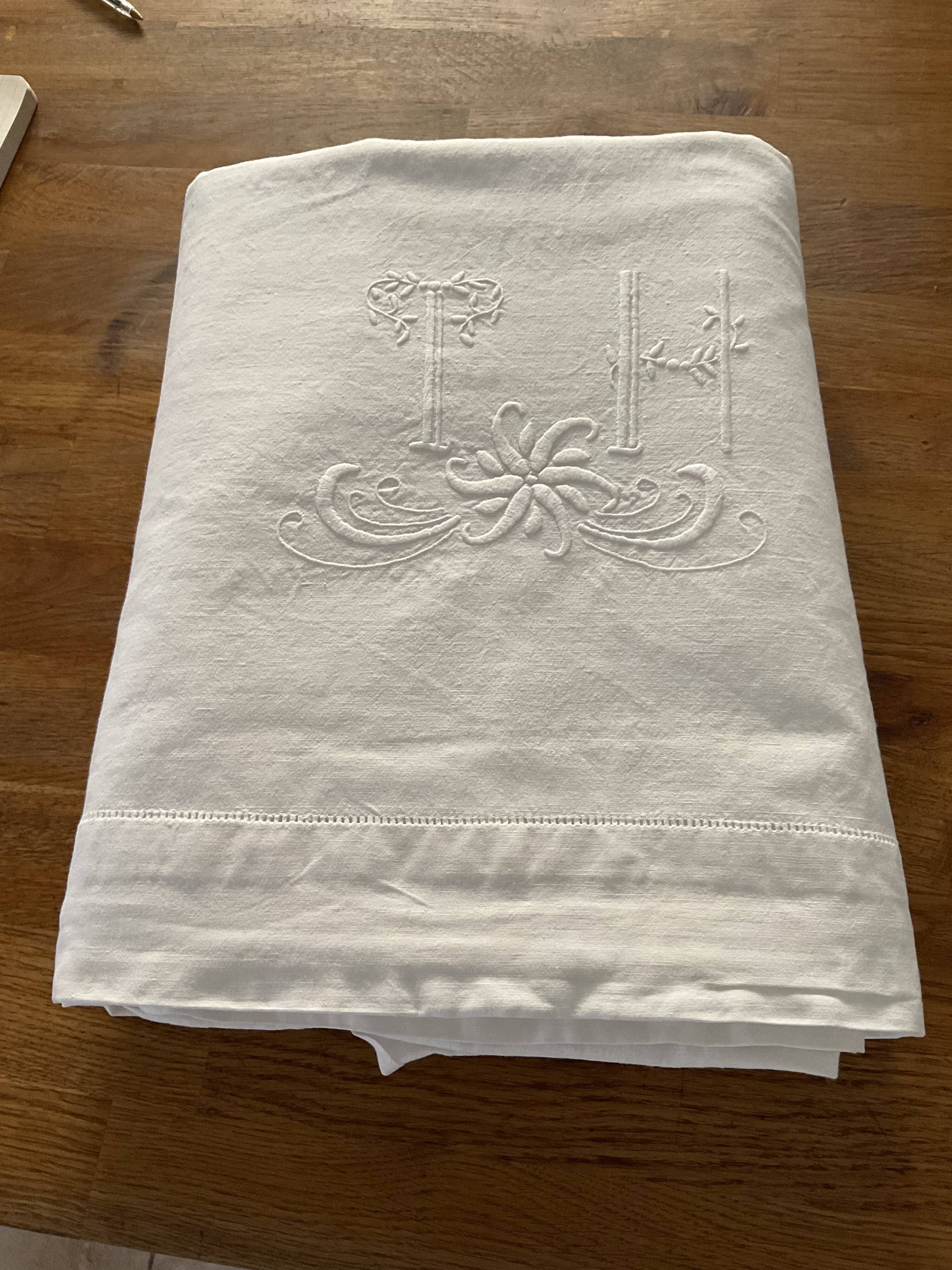 Linen/cotton embroidered sheet.  Monogram TH
