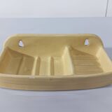 Pale yellow ceramic soap dish