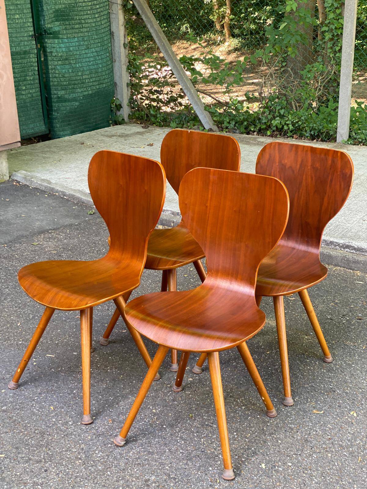 4 vintage Scandinavian dining chairs in curved walnut.