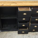 One-door workshop unit with eight black and gold drawers
