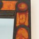 Ceramic mirror in shades of orange