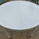 Round cherry wood table extendable to 210 cm without its extensions, completely refurbished.
