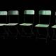 Set of 8 industrial folding chairs in green painted metal