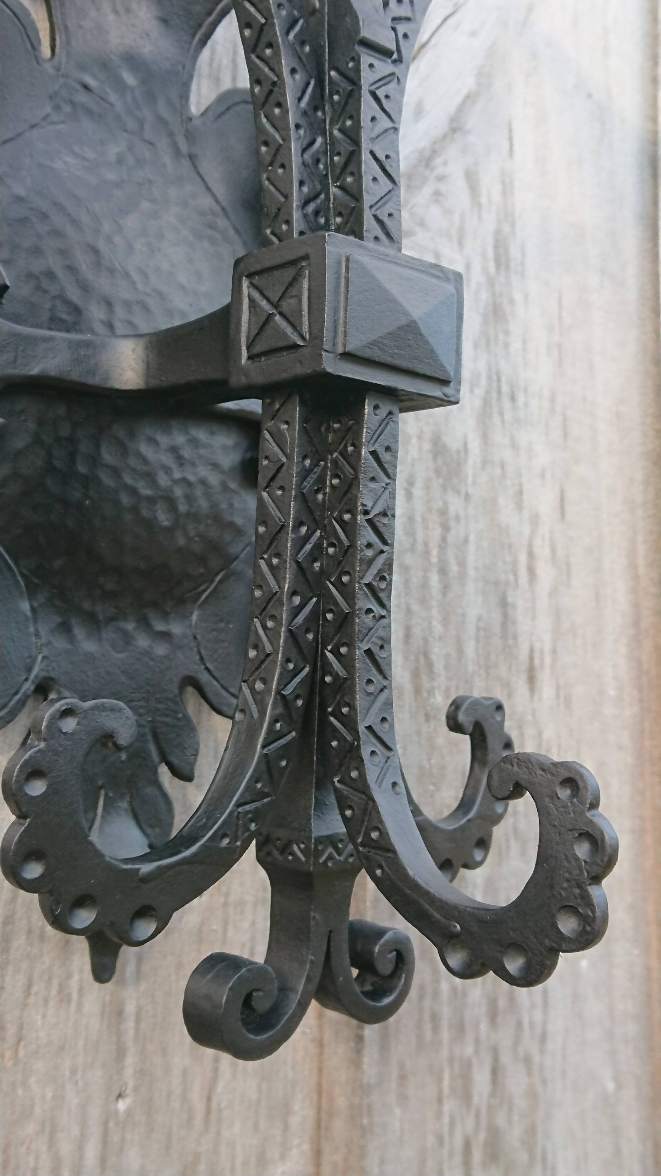 Pair of black wrought iron sconces - neo-Gothic style - from the 1950s