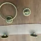 Vintage lucite and brass shelf with its hooks.