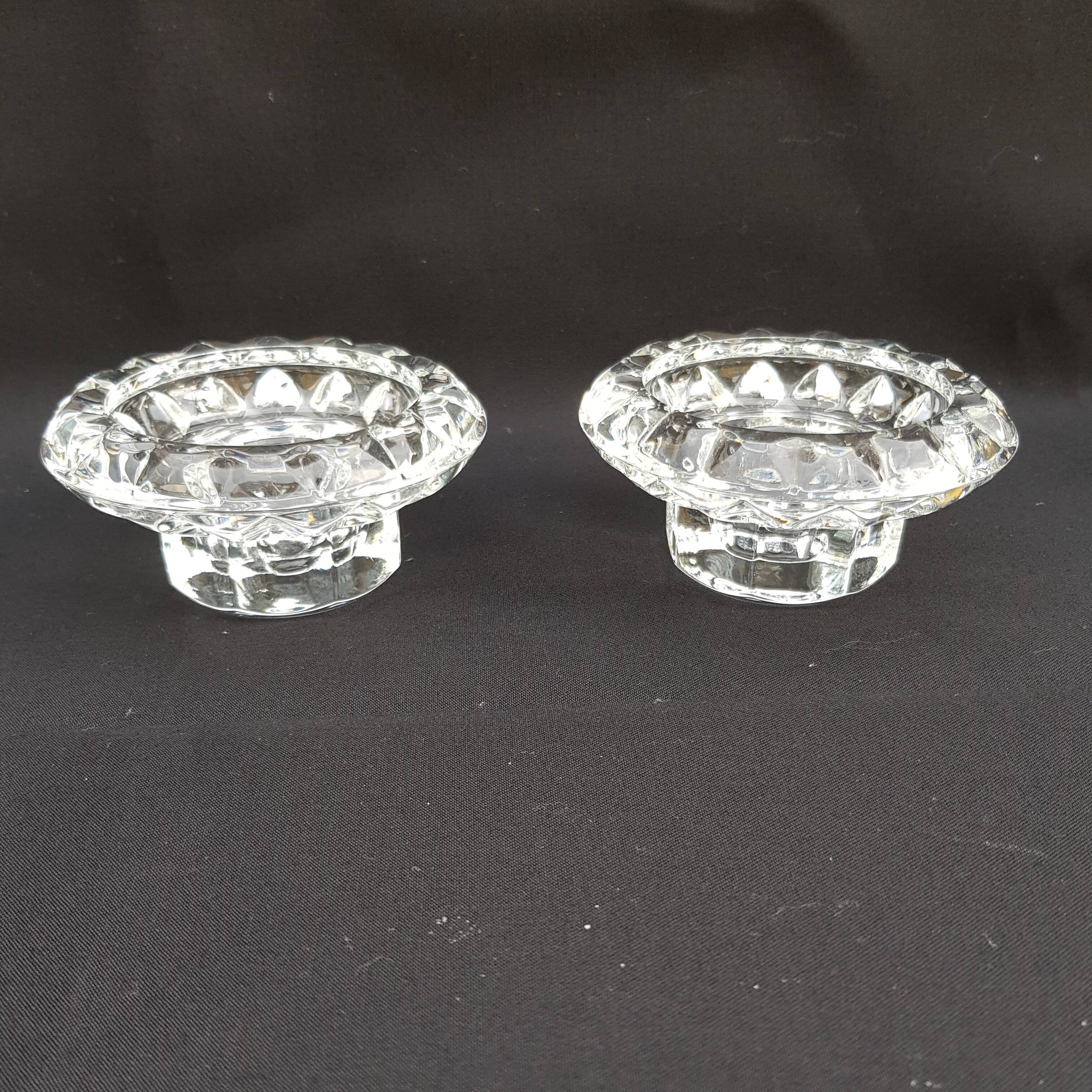 Duo of old glass candlesticks