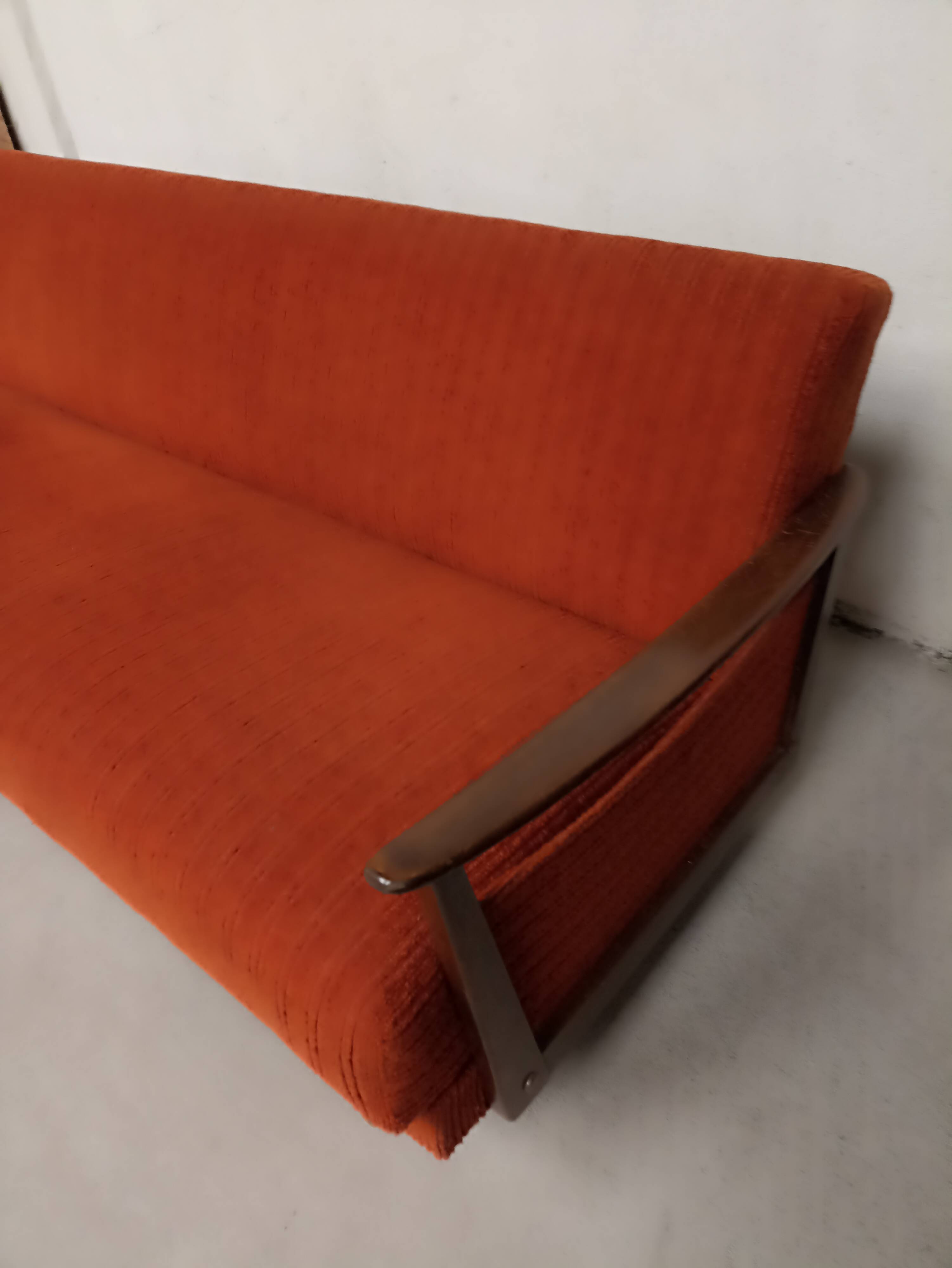 Vintage orange convertible sofa