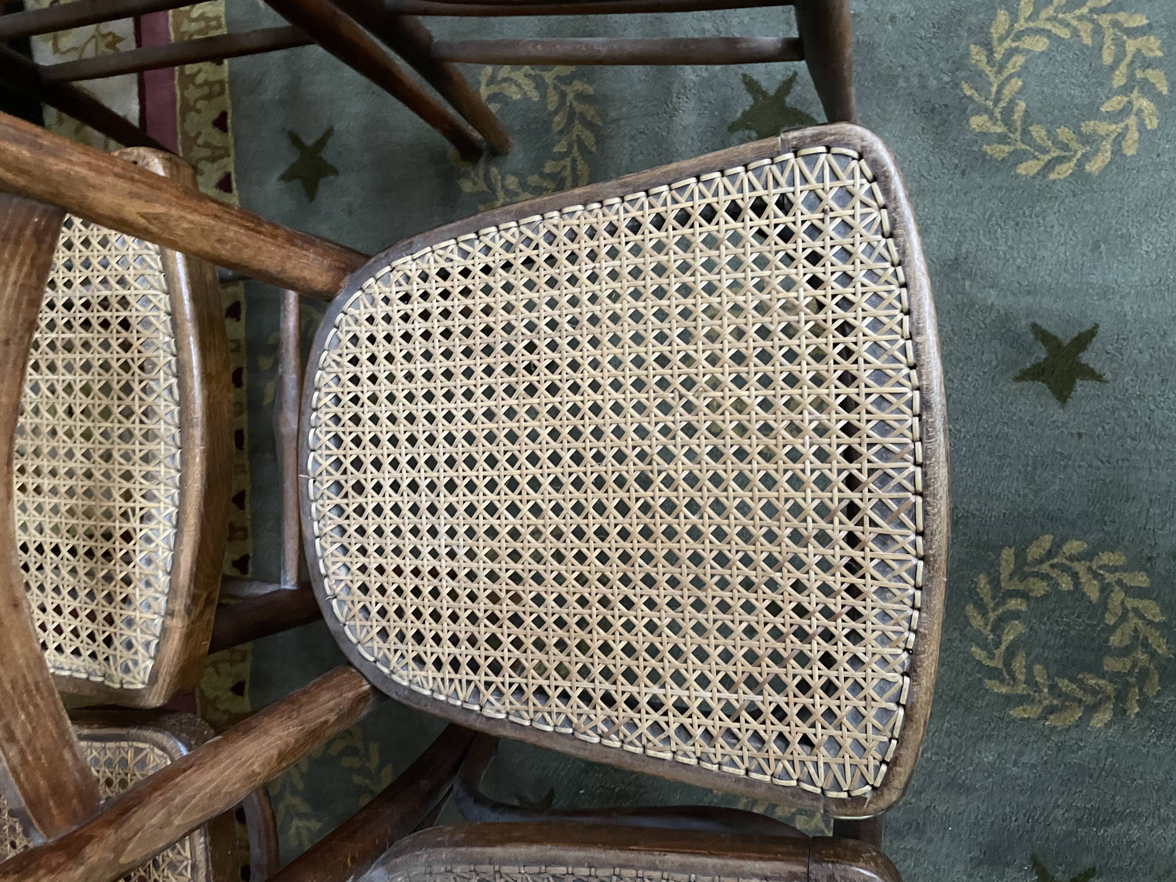 Suite of 10 bistro chairs in cannage