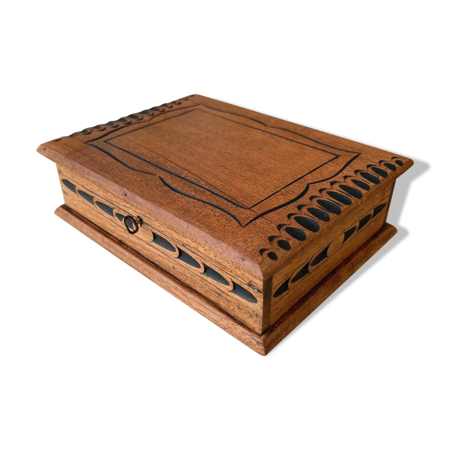 Carved wooden box with key