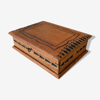 Carved wooden box with key