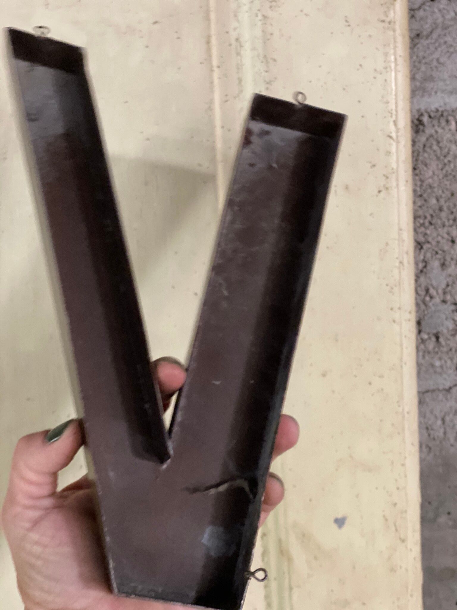 Metal letter V