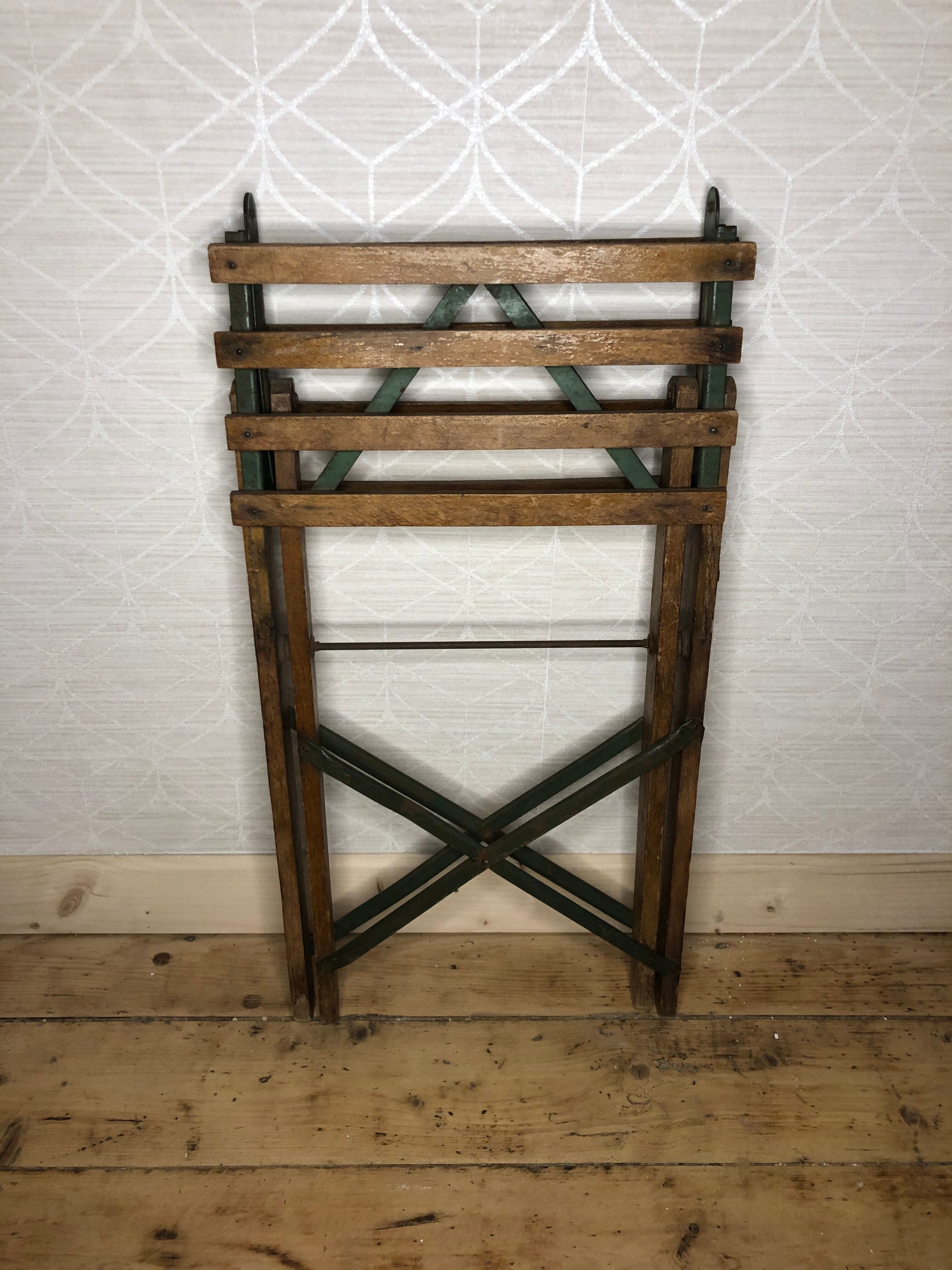 Wooden and iron slatting stool