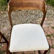 Four vintage Baumann sled chairs from the 1960s 1970s.