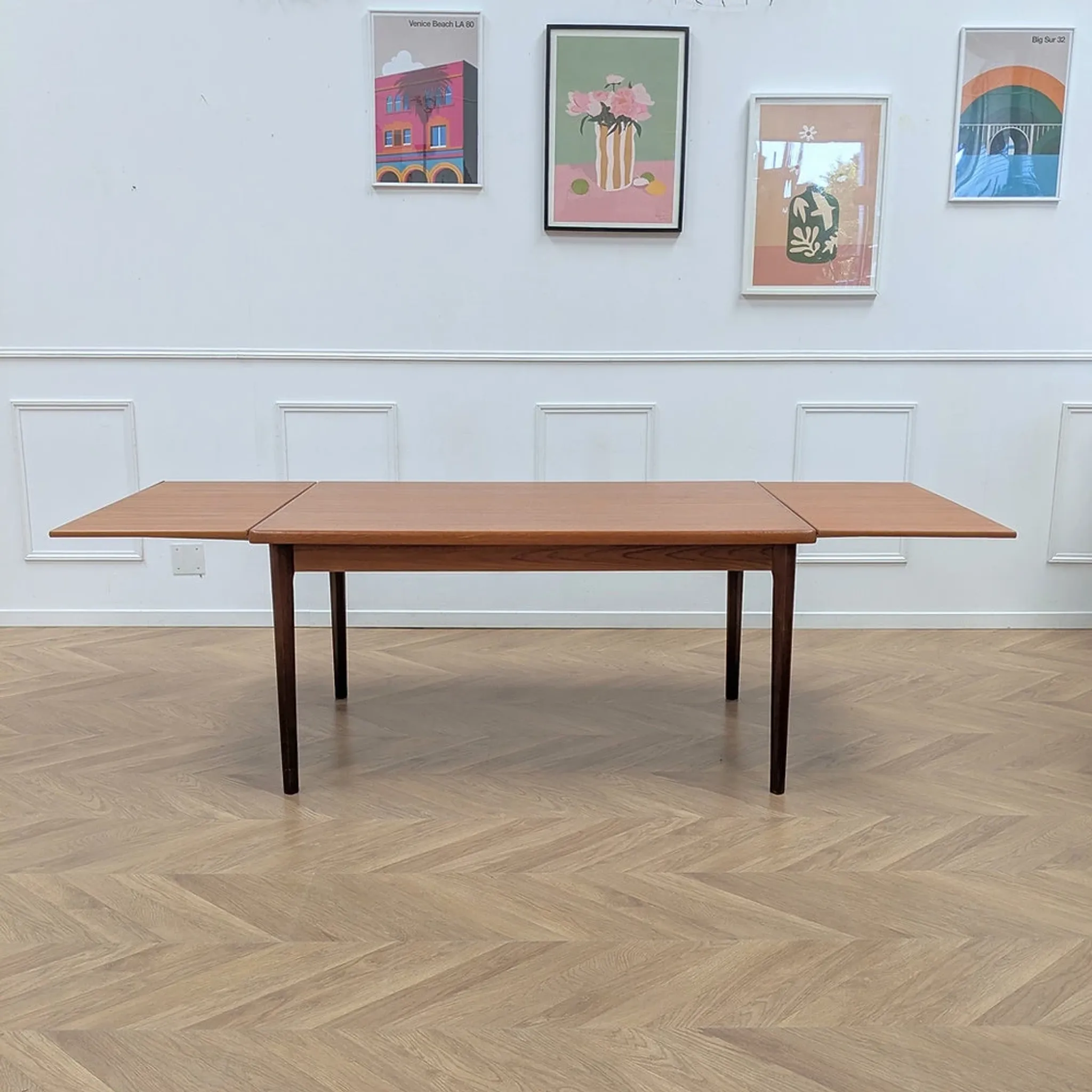 Vintage extendable dining table with 2 extensions in teak.