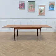Vintage extendable dining table with 2 extensions in teak.
