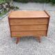 Vintage 1960s commode with compass legs.
