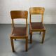 Pair of wooden and leather chairs