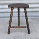Turned wooden tripod stool