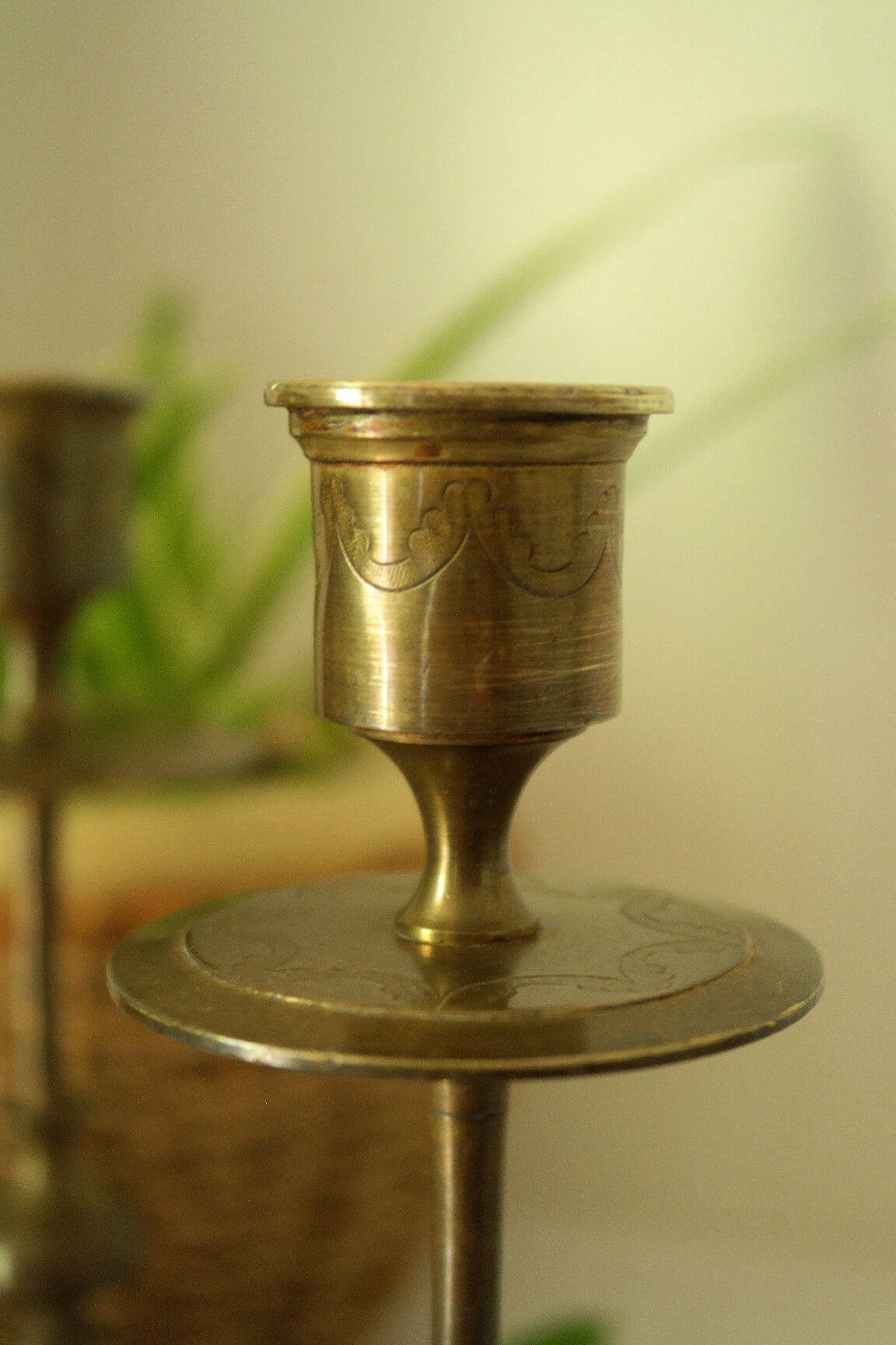 Pair of vintage engraved brass candle holders