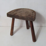 Old half-moon wooden tripod stool
