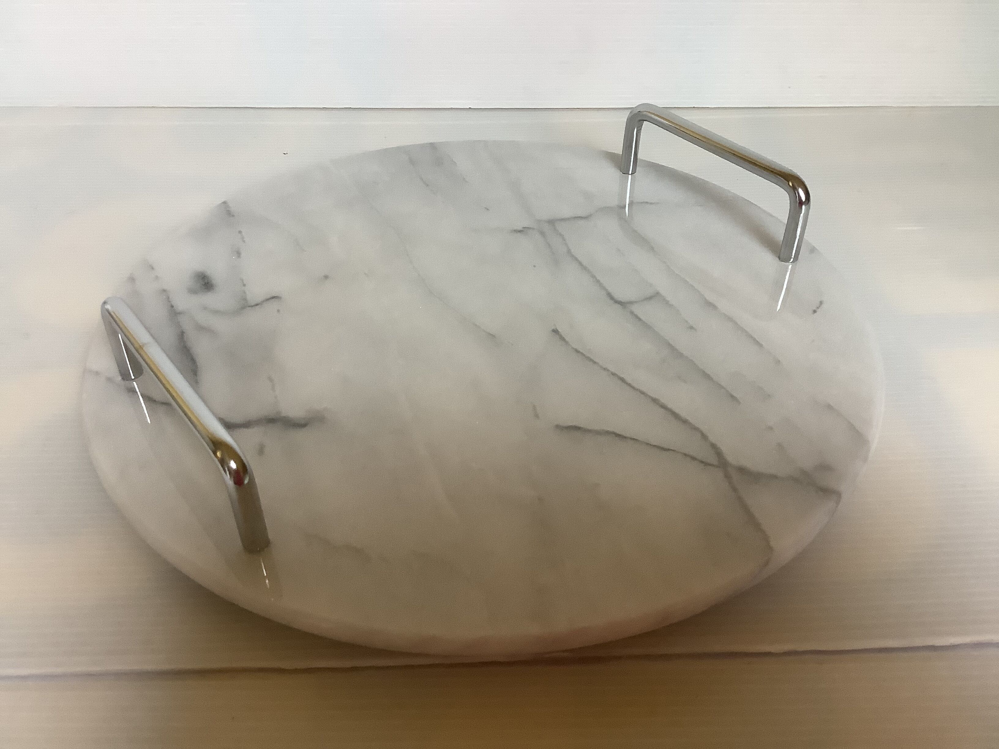 Marble dish with chrome metal handles